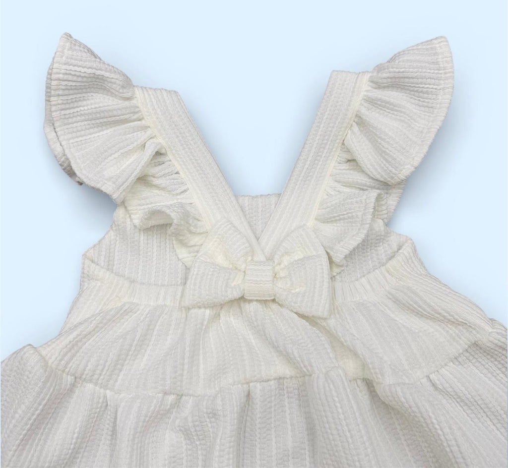 Vestido Infantil "Brisa de Algodón" con Vuelos y Textura Gofrada