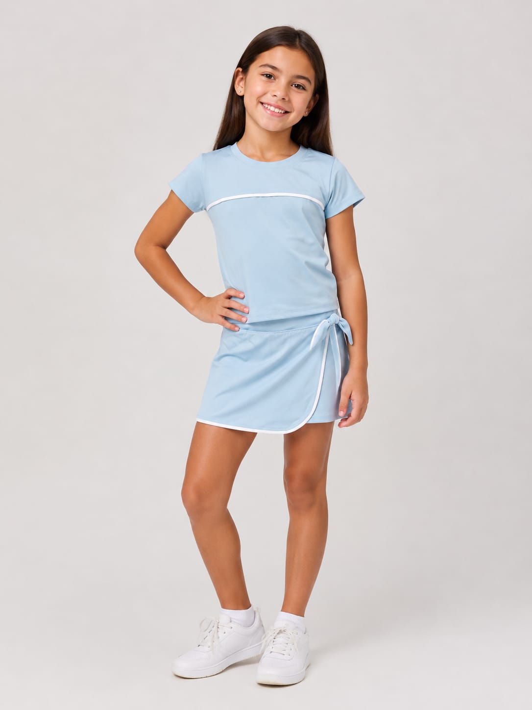 Conjunto Deportivo Premium para Niña: Falda Short y Playera con Detalle de Contraste